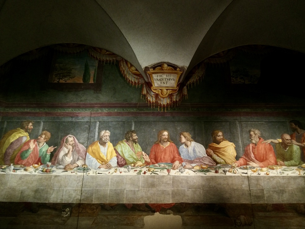 Ultima cena di Alessandro Allori, affresco scuro con colori vibranti.