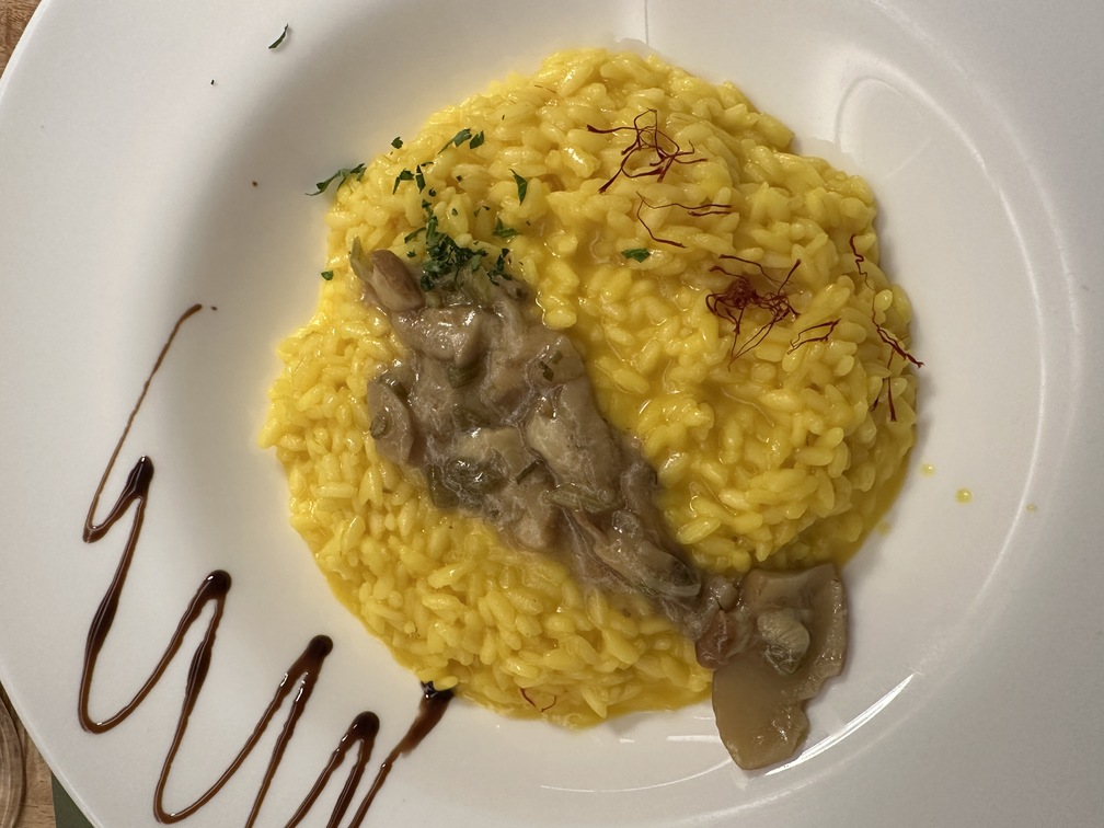 Ristorante Lanterna Verde a Cavalese - risotto allo zafferano e funghi porcini.