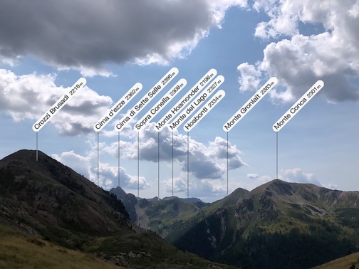 Passo Cadin - veduta versoCrozzi Brusadi e altre cime del Lagorai (app: PeakFinder).