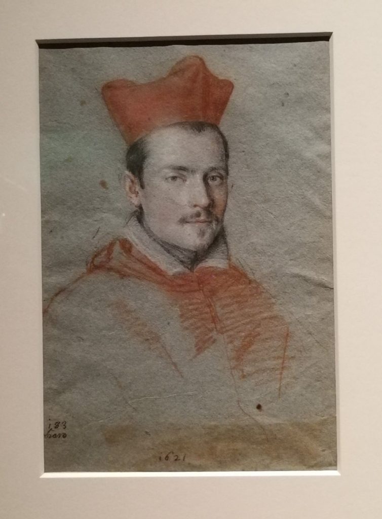 Cardinale Ludovisi con la tonaca rossa, uno sguardo furbo.