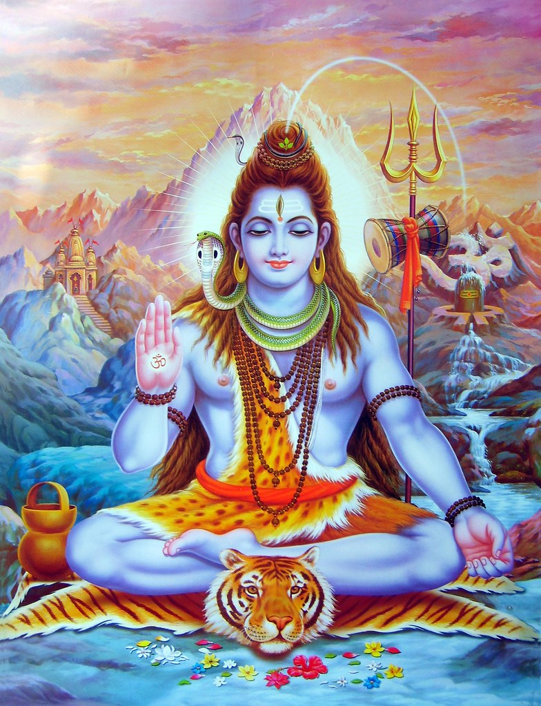 Immagine di Shiva rappresentato come sciamano, colorato e su una pelle di tigre.