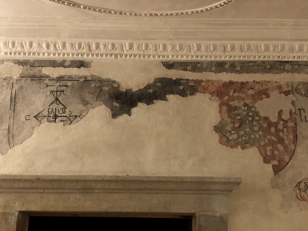 Casa Bertelli - ciclo di affreschi interno, timbro notarile e scudo nobiliare.